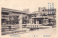 an old black and white photo of some buildings