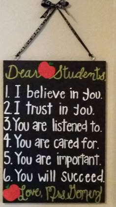 a sign hanging on the wall that says dear students i believe in you 2 if trust in