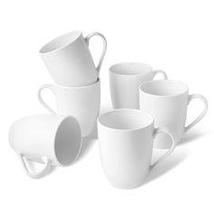 six white coffee cups are stacked on top of each other with one cup in the middle