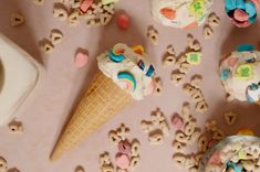 an ice cream cone filled with cereal krispy kreme treats and marshmallows