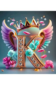 the letter k is surrounded by flowers and jewels, with an elaborate crown on top