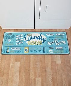 the laundry room door mat is on the floor