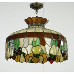 a stained glass lamp hanging from the ceiling