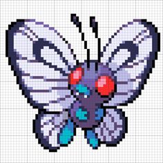 a cross stitch butterfly with red eyes