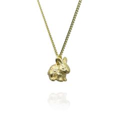 Bunny Charm Reconnect Charm Collection This tiny bunny charm is everything you want from a rabbit necklace: dainty, detailed, and incredibly cute. From the tiny ears, pricked up and alert, to the soulful eyes, and realistic looking fur that looks soft enough to stroke, this rabbit necklace charm ticks ALL the boxes, but also has a powerful message to pass on. If you love rabbits enough to wear a bunny necklace charm, you probably know that millions of rabbits lose their lives in laboratories and Bunny Necklace, Rabbit Charm, Rabbit Pendant, Tiny Bunny, Rabbit Necklaces, Diamond Guide, Themed Jewelry, Animal Jewelry, Birthstone Jewelry