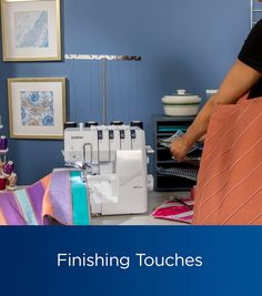 a woman using a sewing machine to sew clothes