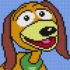 a cross stitch pattern of a dog with big eyes and a smile on his face