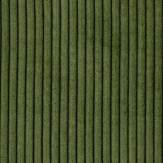 an aerial view of a field with rows of green grass