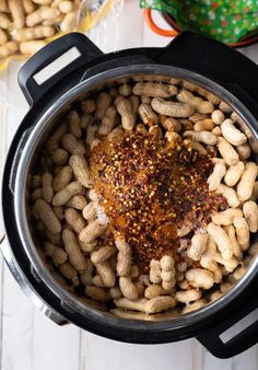 the food in the pot is ready to be cooked and put into the slow cooker