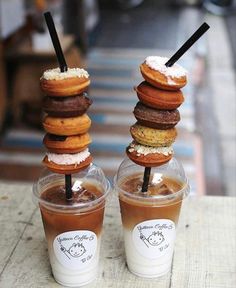 two cups with donuts on top of each other