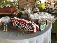 a table topped with lots of food and desserts