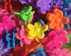 a pile of colorful plastic hair clips