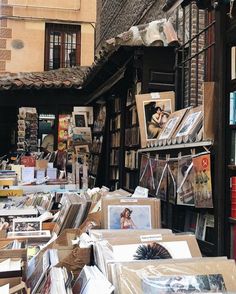 there are many books and magazines on the shelves