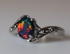 This Anniversary Rings item by KissedByFireJewelry has 3030 favorites from Etsy shoppers. Ships from Hollywood, FL. Listed on Sep 28, 2023 Fire Opal Ring Opal Auctions, Black Opal Engagement Ring Capucinne, Nightvale Ring, Fire Opal Engagement Ring Opal Auctions, Natural Fire Opal Ring, Dark Green Opal Ring, Opal Wedding Ring Black Band, Opal Engagement Ring Black Band, Luxury Black Opal Ring, Elegant Style