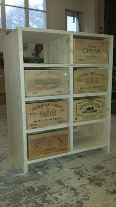 several wooden boxes stacked on top of each other