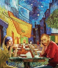 two people sitting at a table in front of an image of a cityscape