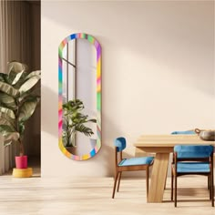 a room with a table, chairs and a mirror on the wall next to a potted plant