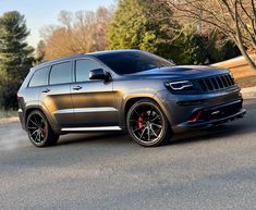 the jeep is parked on the side of the road