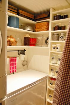 the kitchen is organized and ready to be used as a storage area for food items