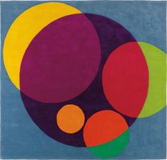 an abstract painting with different colors and shapes on blue background, including circles in the center