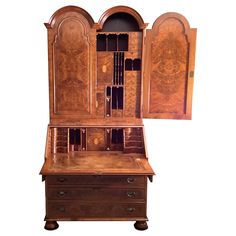 an old fashioned wooden desk with drawers