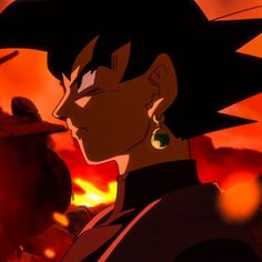 an anime character with black hair and green earrings in front of a red sky at sunset