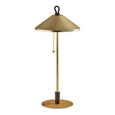 a lamp that is sitting on top of a wooden base and has a black handle