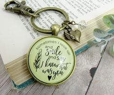 a keychain that has some writing on it