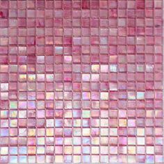 a pink and white mosaic tile wall