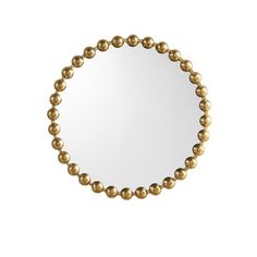 a gold beaded mirror on a white wall