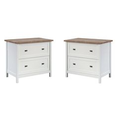 two white dressers with brown tops on each side and one in the same color