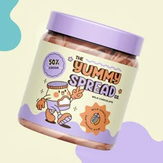 a jar of yummy spread on top of a purple and blue background