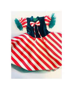 This cute Candy Cane Elf Girl Dress is for your Princess to be an Elf, This flower toddler dress is perfect for your speacial occasions; Chrsitmas parties, photoshoots, christening.. She will be a star with this Candy Cane Christmas design dress.. Green Silk Velvet Fabric is used for top part, candy cane colors printed fabric is used for the skirt part and also there is green tulle under the skirt matched with sleeves tulle. We designed this dress for the adorable pictures, photos for the Christ Elf Dress, Christmas Toddler, Elf Girl, Dress Photoshoot, Adorable Pictures, Under The Skirt, Green Tulle, Silk Velvet Fabric, Dress Christmas