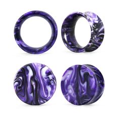 three different types of purple and black marbles