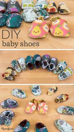 baby shoes made out of fabric are sitting on the floor and in front of them