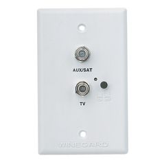 the white wall plate has two buttons on each side and is attached to an electrical outlet