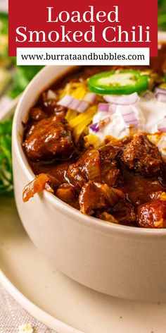 a white bowl filled with loaded smoked chili