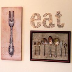 there are two pictures on the wall with spoons and forks in them, one has an eat sign next to it