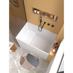 an aerial view of a bathtub and toilet in a bathroom