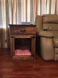 a living room with a recliner chair and end table