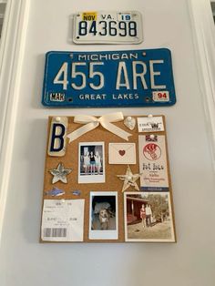 a bulletin board with pictures and magnets on it that says michigan 455 are great lakes