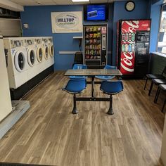 the laundry room is clean and ready for customers to use