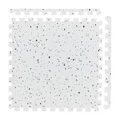 a white floor mat with black dots on the top and bottom, in front of a white background