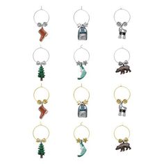 six different key chains with animals and trees on them, all hanging from the same line