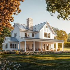 a large white house with a metal roof