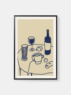 a table with wine, cookies and bread on it is framed in black wood frame