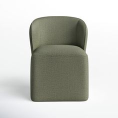 a green chair sitting on top of a white floor