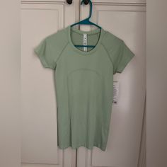 Nwt Light Green, Size 6 Lululemon Short Sleeve Swiftly Tech, Never Worn - Open To Offers Lululemon Accessories, Lulu Tops, Lulu Shirt, Lulu Fits, Lululemon Short Sleeve, Anna Claire, Lululemon Shirts, Green Lululemon, Lululemon Shirt