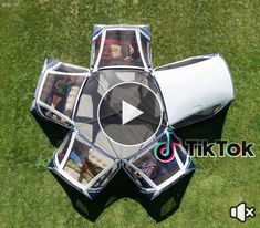 an overhead view of the inside of a tent with pictures in it on top of grass