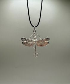 Gorgeous dragonfly pendant. For bug and insect lovers. This is a unique work done all by a passionate artist from design, production, and finish. This pendant is included with a black waxed cord necklace(18in). **Note: Pictures are enlarged to show detail. All pendants are packaged and shipped in a cotton baggy inside a water and tear-resistant bubble wrap envelope. If you have any questions about this item or any other items listed in our shop please do not hesitate to contact us.** Made out of Note Pictures, Dragonfly Necklace, Dragonfly Pendant, Bugs And Insects, Cord Necklace, Bubble Wrap, Random Stuff, Jewelry Necklace Pendant, Accessory Gift